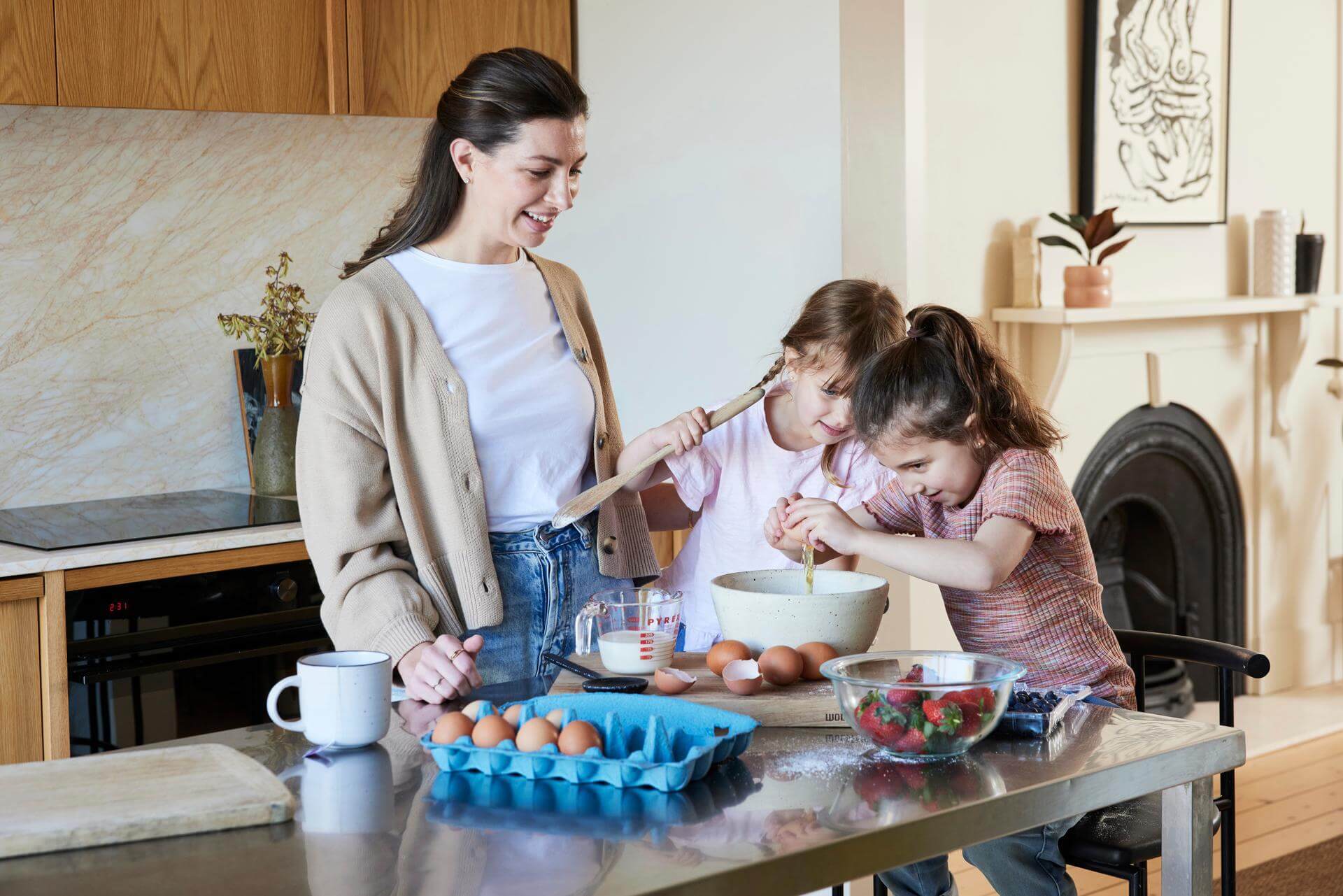 Woman and children baking in kitchen 1